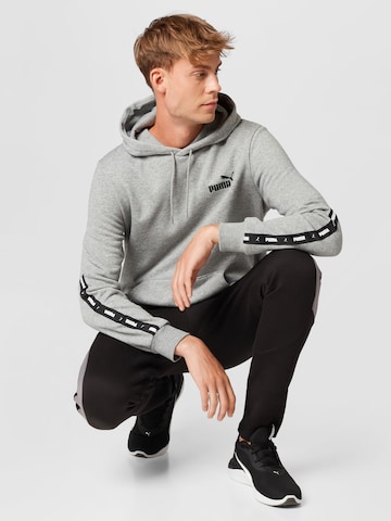PUMA Athletic Sweatshirt 'ESS+' in Grey