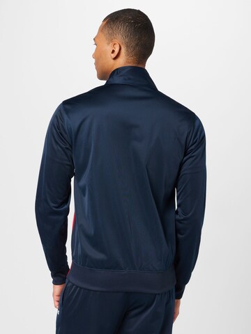 Champion Authentic Athletic Apparel Tracksuit in Blue