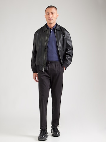 JACK & JONES Alt kitsenev Püksid 'JWHACE NICO', värv must