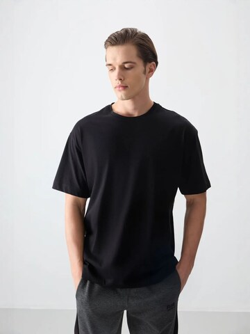 Tommy Life T-Shirts in Schwarz