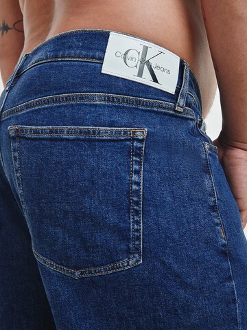 Calvin Klein Big & Tall Tapered Jeans in Blauw