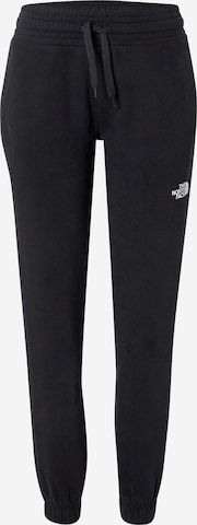 THE NORTH FACE Tapered Workout Pants in Black: front