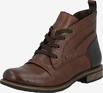 Bottines 'Lederstiefeletten „Odeon“' Rieker en marron : devant