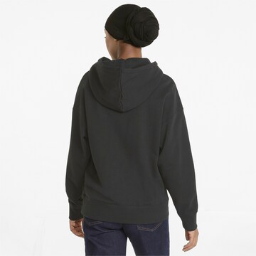 PUMA Sweatshirt 'SWxP' in Zwart