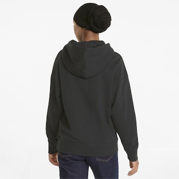 Sweat-shirt 'SWxP' PUMA en noir