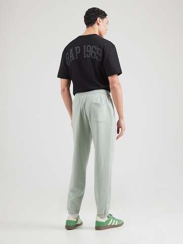 zils GAP Pakapēniski sašaurināts piegriezums Bikses 'DISNEY X GAP'