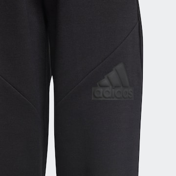 ADIDAS SPORTSWEAR Tapered Παντελόνι φόρμας 'Future Icons' σε μαύρο