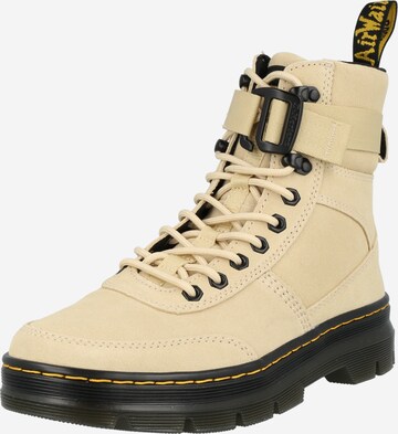 Dr. Martens Nauhabootsit värissä beige: edessä