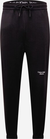 Pantalon Calvin Klein Jeans en noir : devant