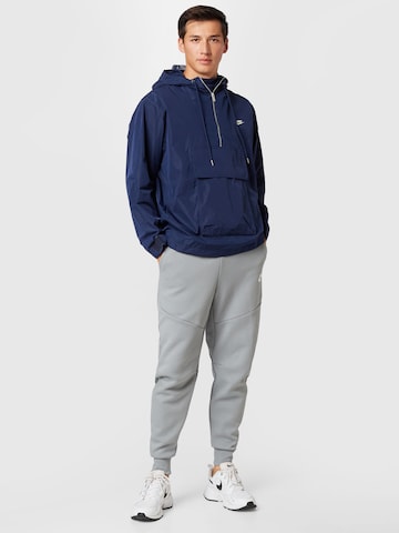 Nike Sportswear Overgangsjakke i blå