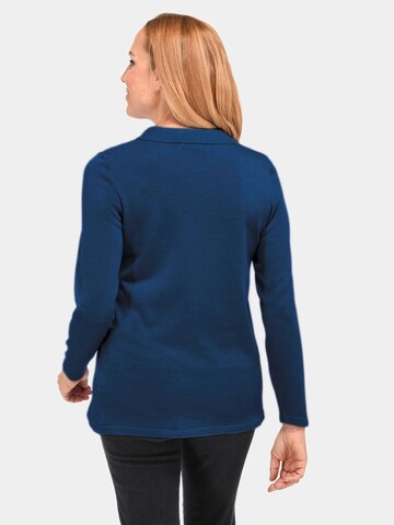 Goldner Pullover in Blau