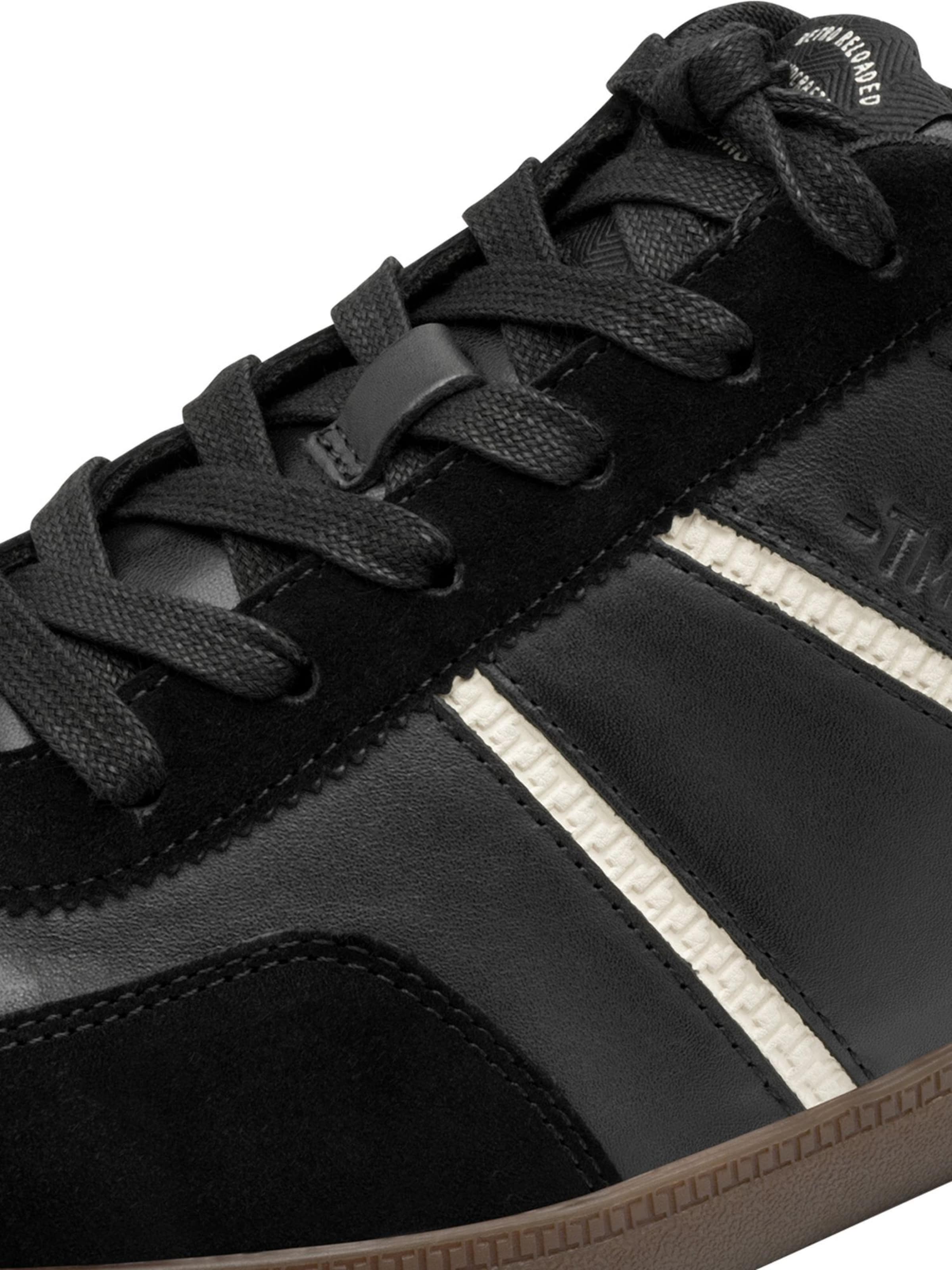 Baskets basses Tamaris en noir