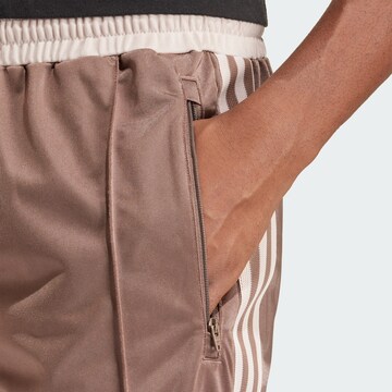 ADIDAS ORIGINALS Regular Trousers in Brown