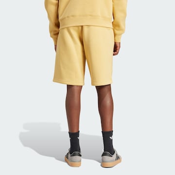 ADIDAS ORIGINALS Regular Trousers 'Trefoil Essentials' in Yellow