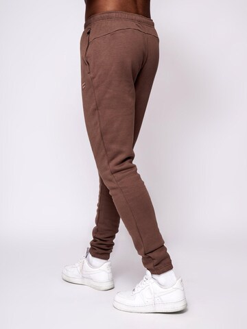 Fortex Fitness Slimfit Sportbroek 'Essential Jogger' in Bruin