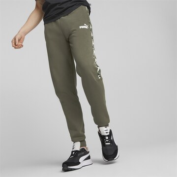 PUMA - Tapered Pantalón deportivo en verde: frente