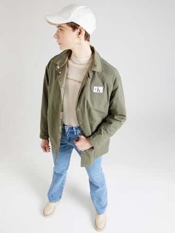 Calvin Klein Jeans Välikausitakki värissä vihreä