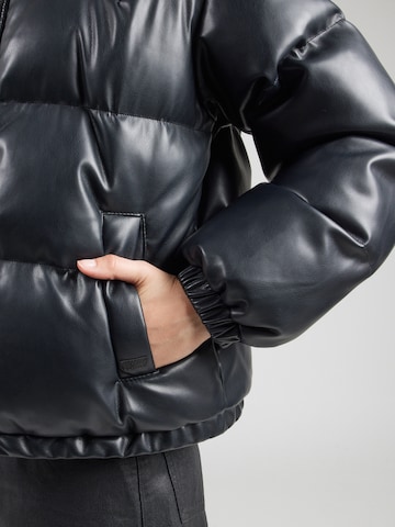 LEVI'S ® Преходно яке 'Noe Western Puffer' в черно