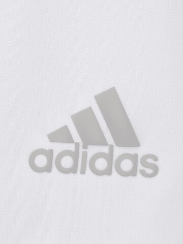 ADIDAS GOLF - Camiseta funcional en blanco