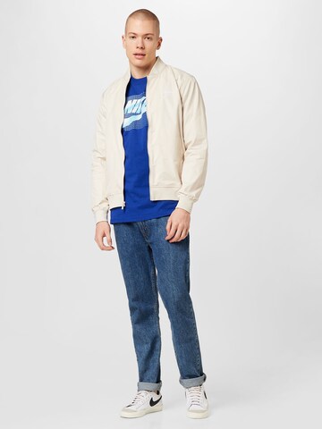 Nike Sportswear - Camisa 'FUTURA' em azul