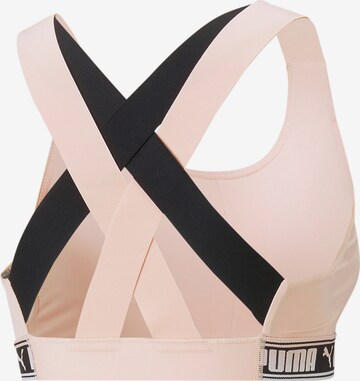 PUMA Bustier Sport bh 'Feel It' in Roze