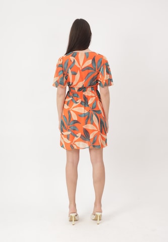 Elara Kjole i orange