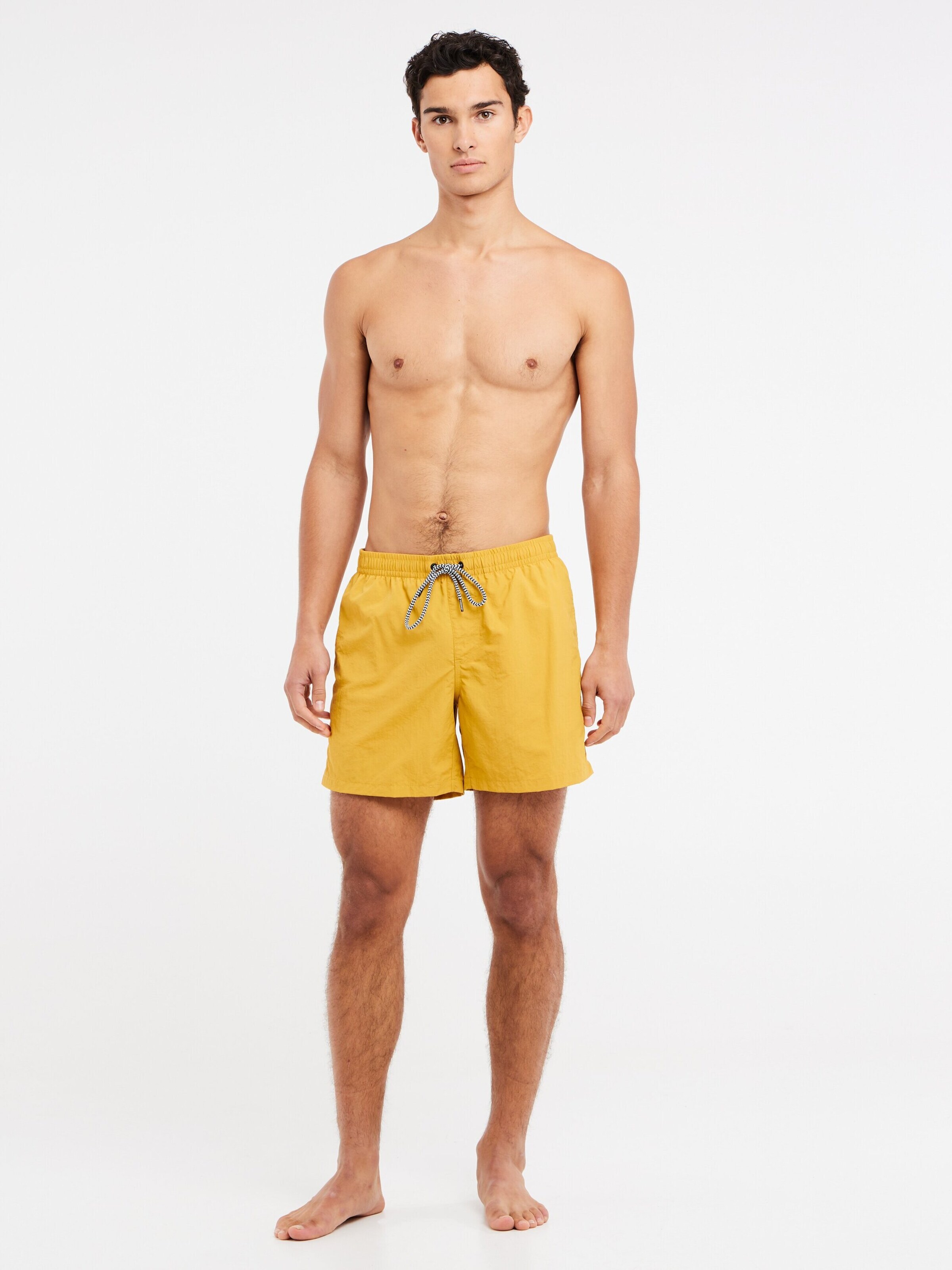 PROTEST Swimming shorts 'Faster' in Yellow: front