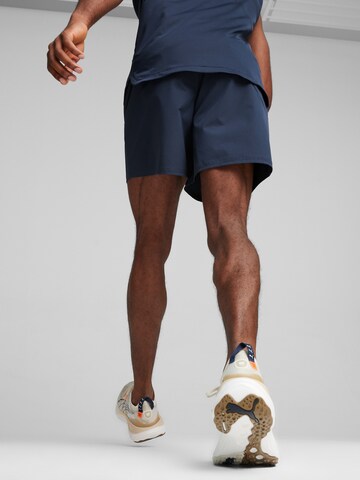PUMA Regularen Športne hlače 'First Mile' | modra barva