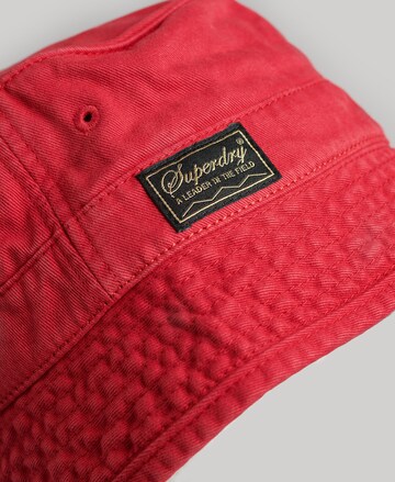 Chapeaux Superdry en rouge