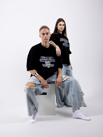 BTY Oversized tričko 'Unisex Oversized T-shirt' – černá