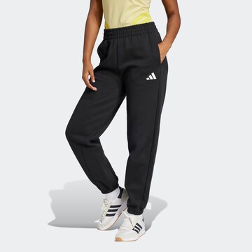 ADIDAS SPORTSWEAR Tapered Workout Pants in Black: front