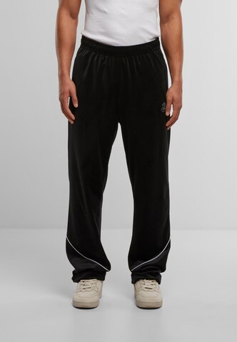 regular Pantaloni sportivi di Karl Kani in nero