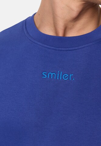 Sweat-shirt smiler. en bleu