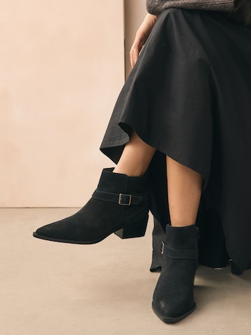 Next - Botim em preto