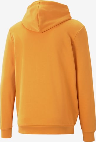 Sweat de sport PUMA en orange