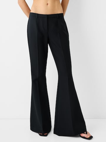 Bershka Flared Pleated Pants in Black