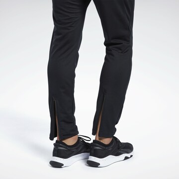 Effilé Pantalon de sport Reebok en noir