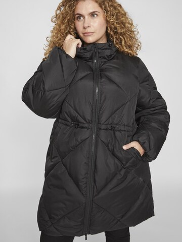 Manteau d’hiver EVOKED en noir : devant