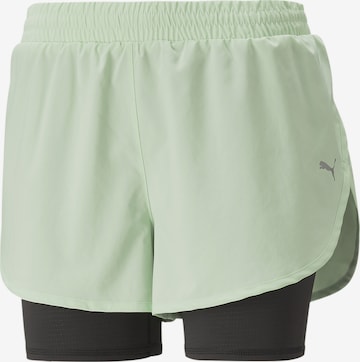 PUMA Workout Pants in Green: front