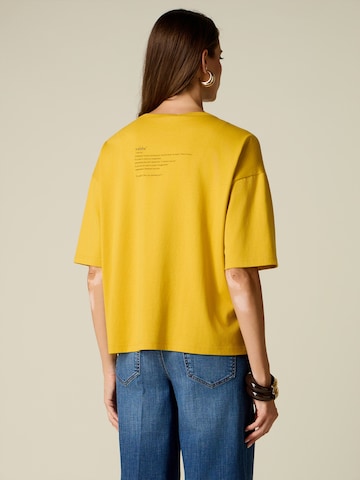 Maglietta di oltre in giallo