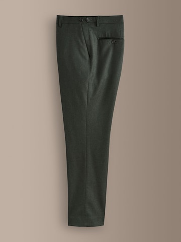 Slimfit Pantaloni con piega frontale di Next in verde