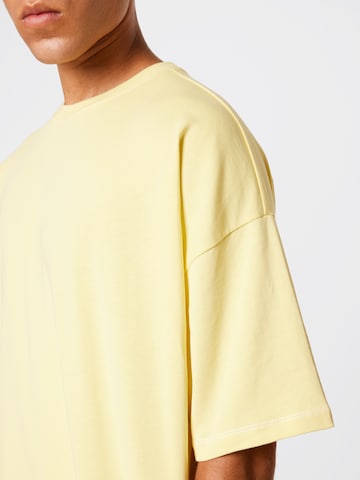 ABOUT YOU Limited Koszulka 'Flynn' w kolorze żółty