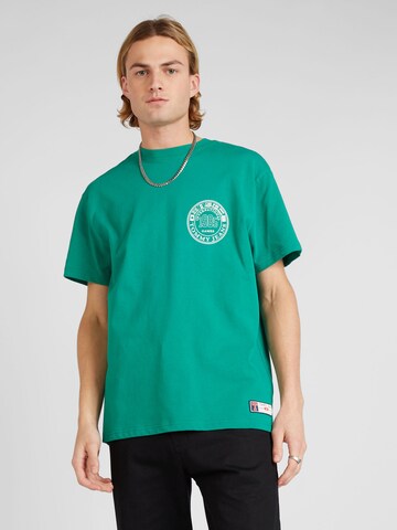 T-Shirt 'ARCHIVE GAMES' Tommy Jeans en vert : devant