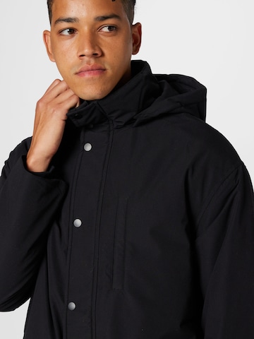 Manteau mi-saison 'Paul' ABOUT YOU en noir