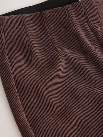 Skinny Leggings di Next in marrone