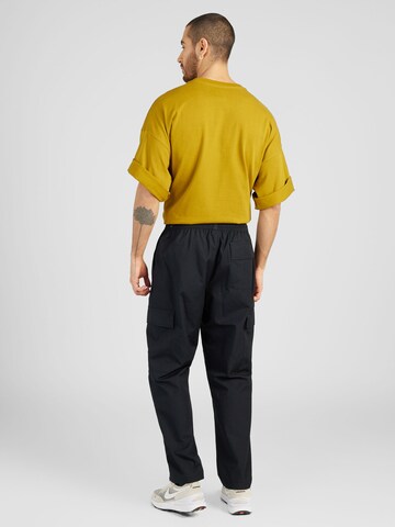 Nike Sportswear - regular Pantalón cargo en negro