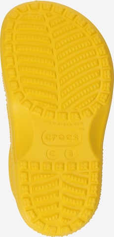 Crocs Rubber boot 'Classic' in Yellow