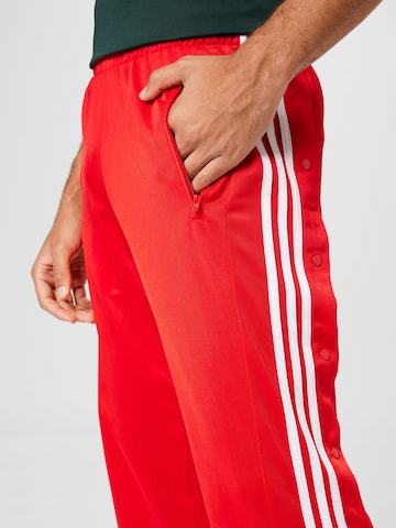 ADIDAS ORIGINALS - Regular Calças 'Adicolor Classics Adibreak' em vermelho
