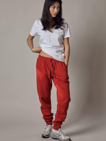 regular Pantaloni 'Felpati' di OWN Off With Nature in rosso