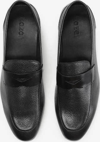 Slipper di Kazar in nero